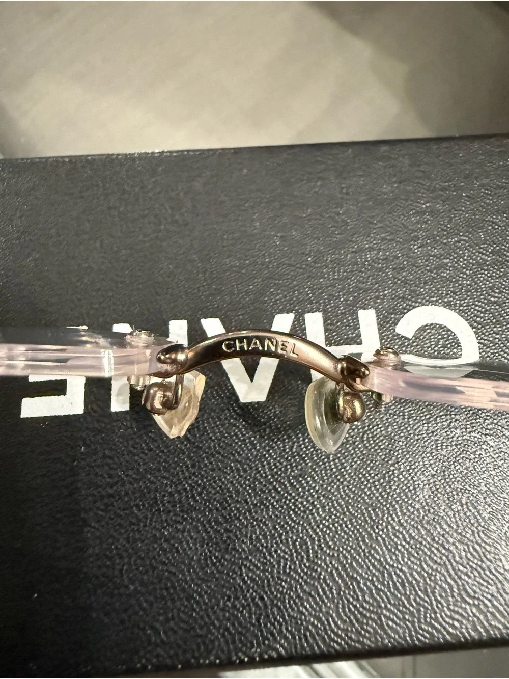 CHANEL Rimless Women's Glasses with bronze Accents